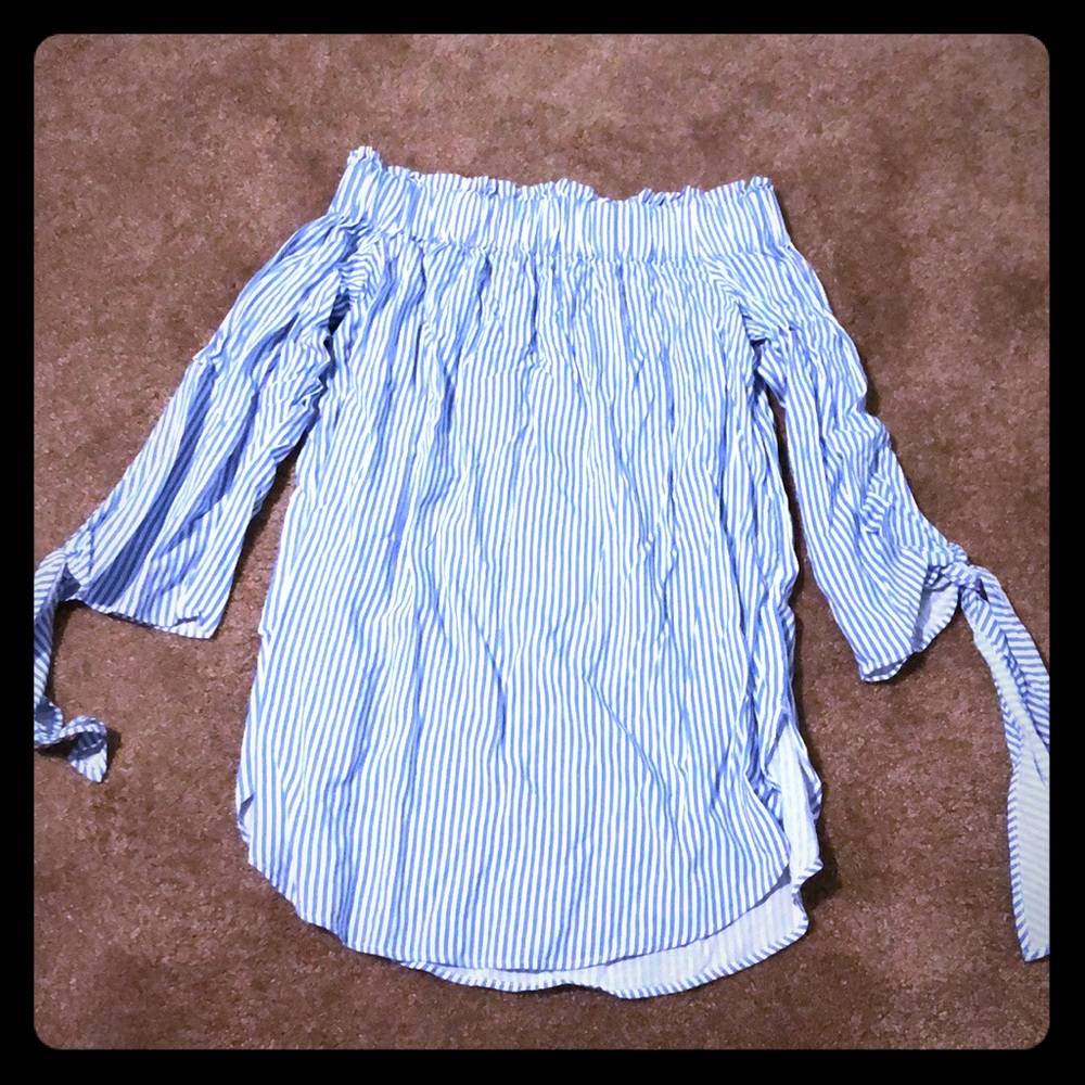 Never been worn off the shoulders blouse